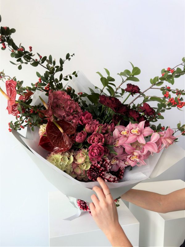 Premium bouquet including an Orchid with a selection of premium blooms.